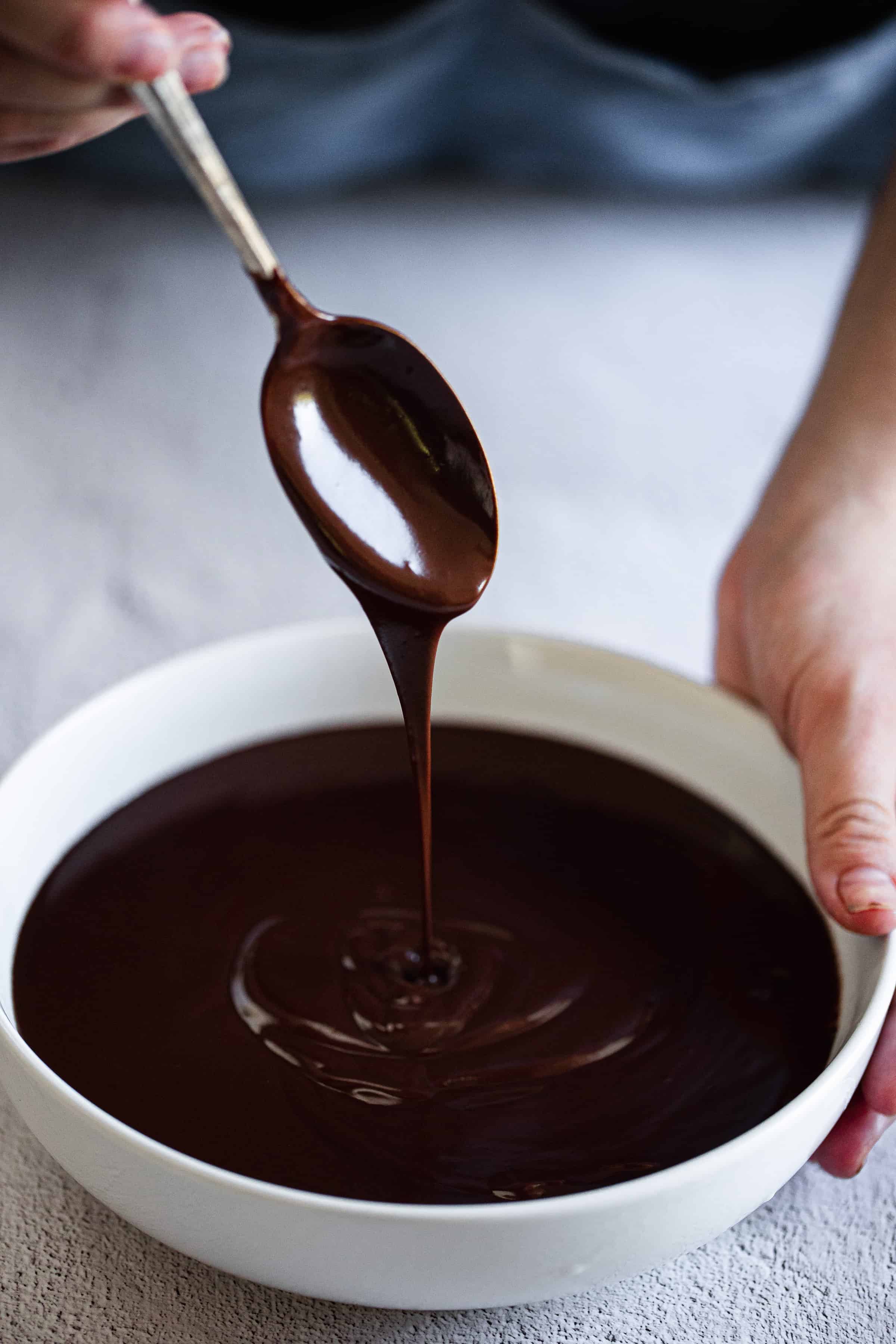 vegan chocolate ganache drips off spoon