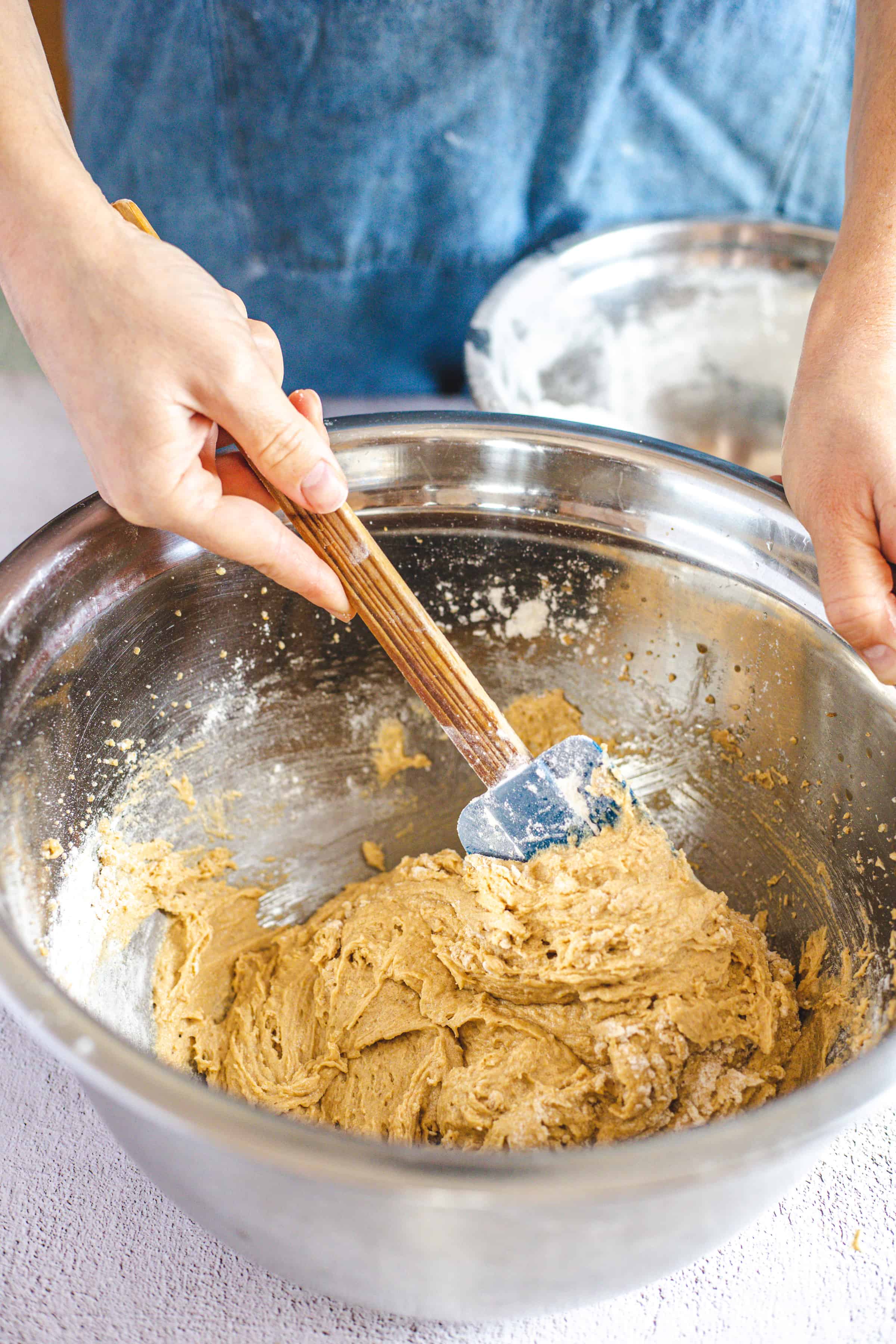 mixing cookie dough in bowl