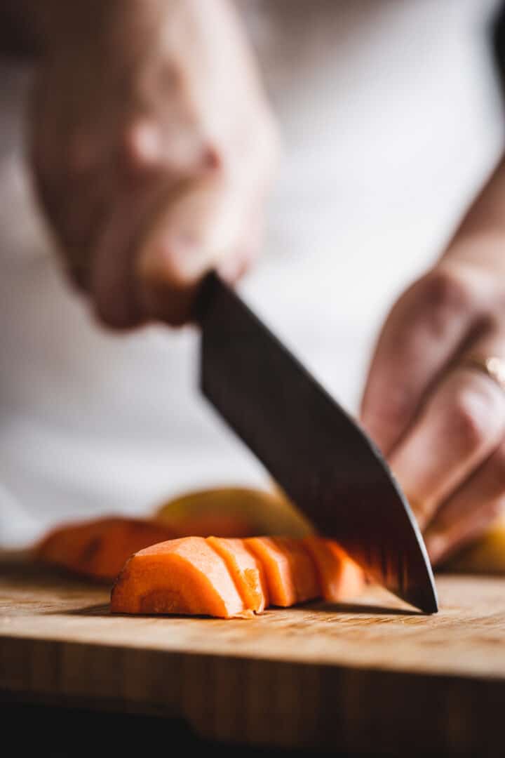 dicing potatoes for sheet pan chicken and veggies