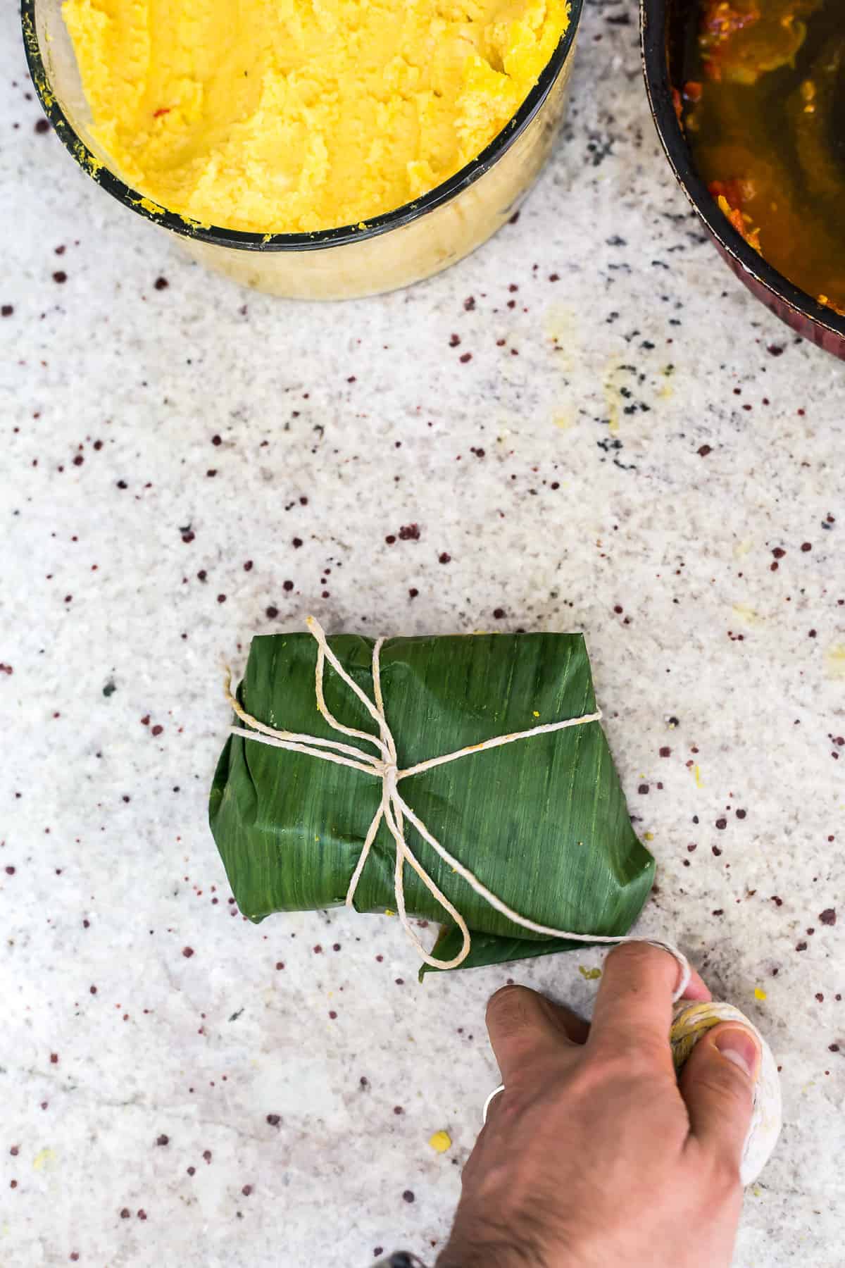 tying a tamal with butcher twine