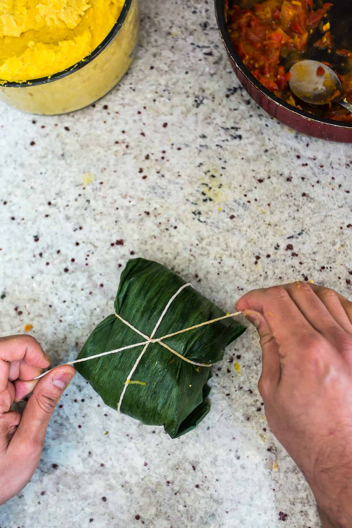 tying a tamal with butcher twine