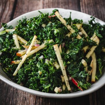 kale and apple salad in a bowl  Apple olive oil cake Kale and apple salad THUMBNAIL 360x360