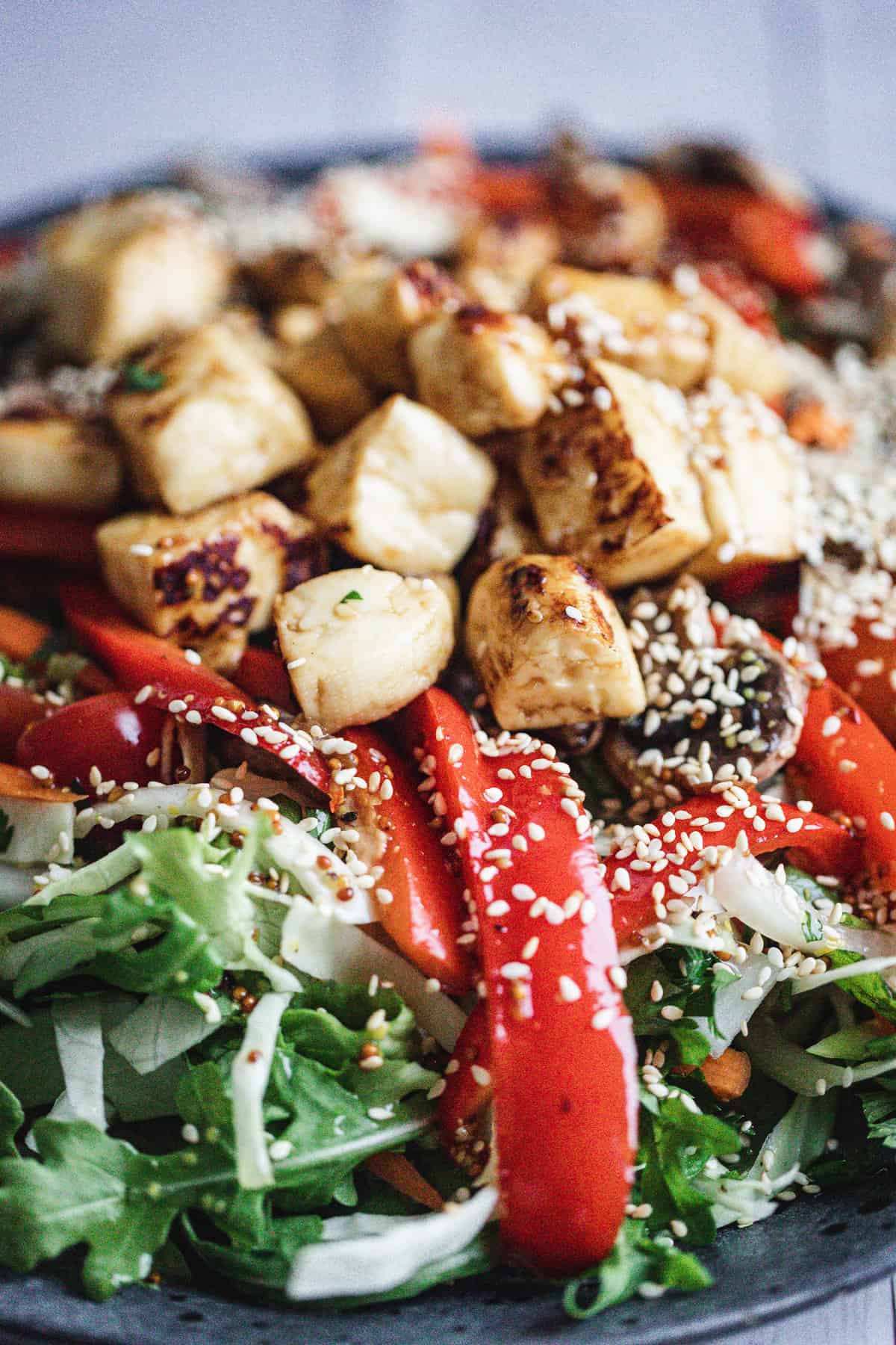 close up on salad ingredients with sesame seeds