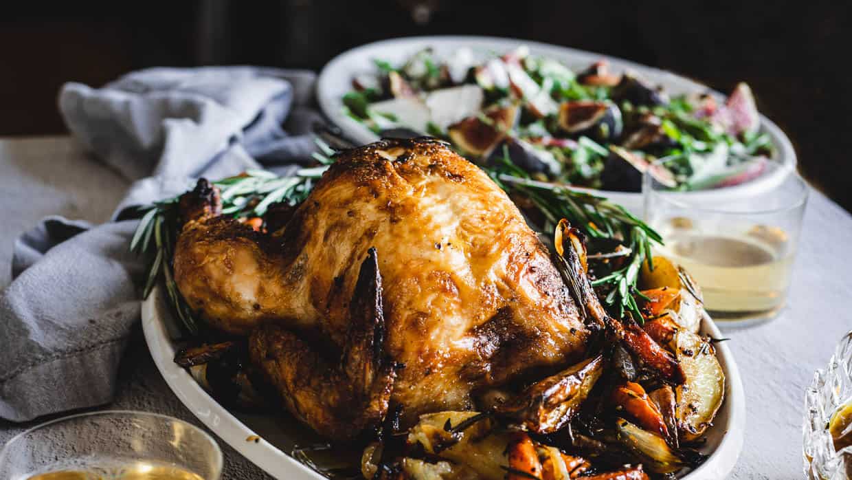 whole roasted chicken on table