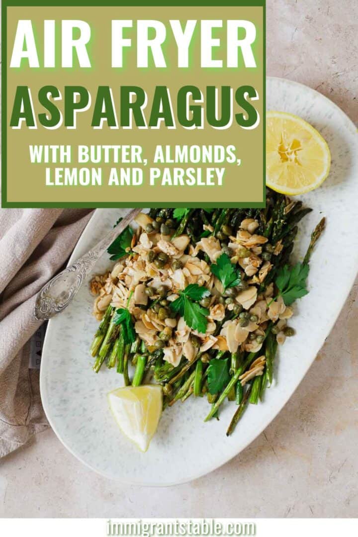 overhead of air fryer asparagus in blue plate with spoon