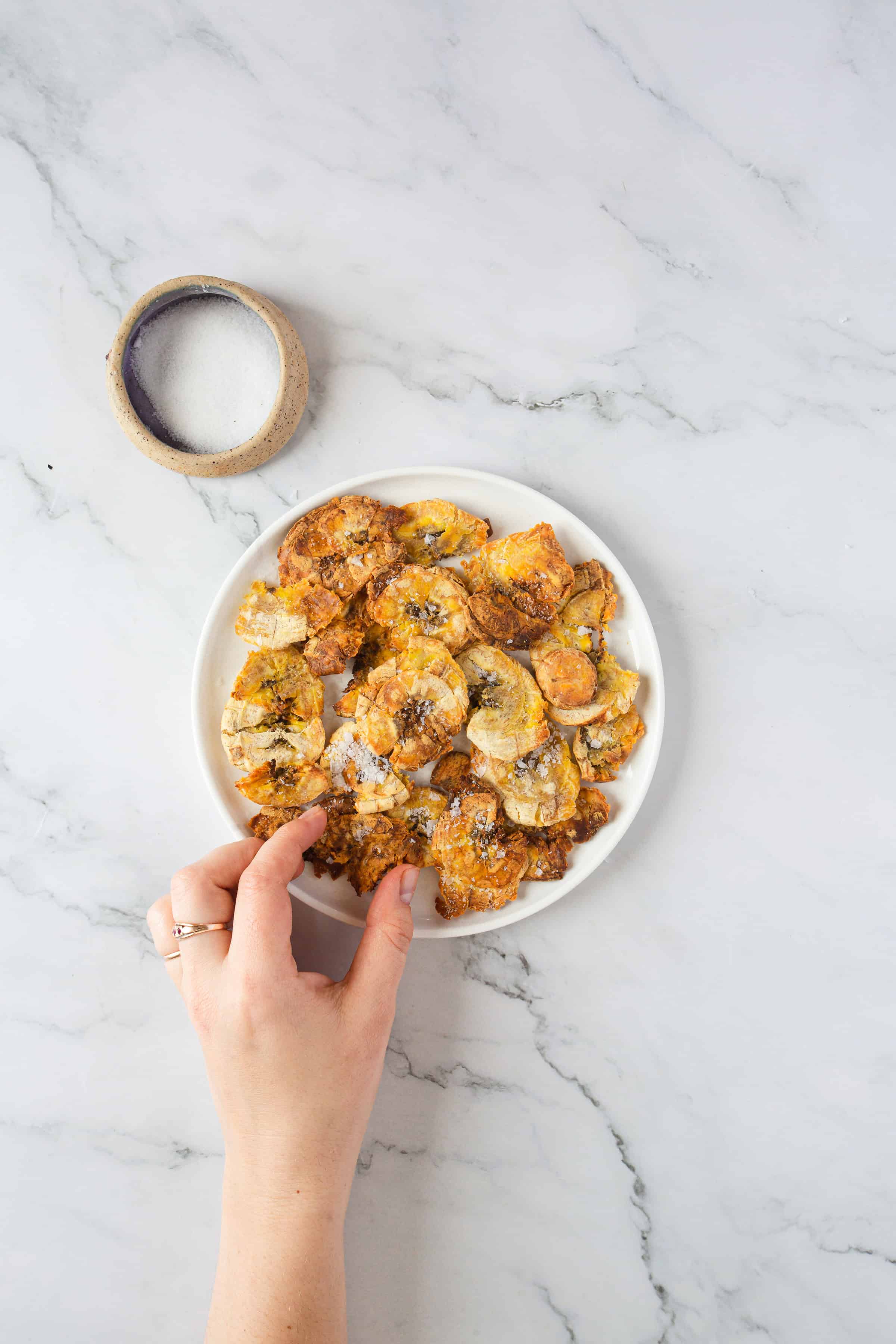 air fryer plantain tostones on white plate