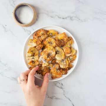 air fryer plantain tostones on white plate