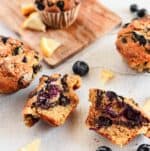 gluten free blueberry muffin cut in half and more around