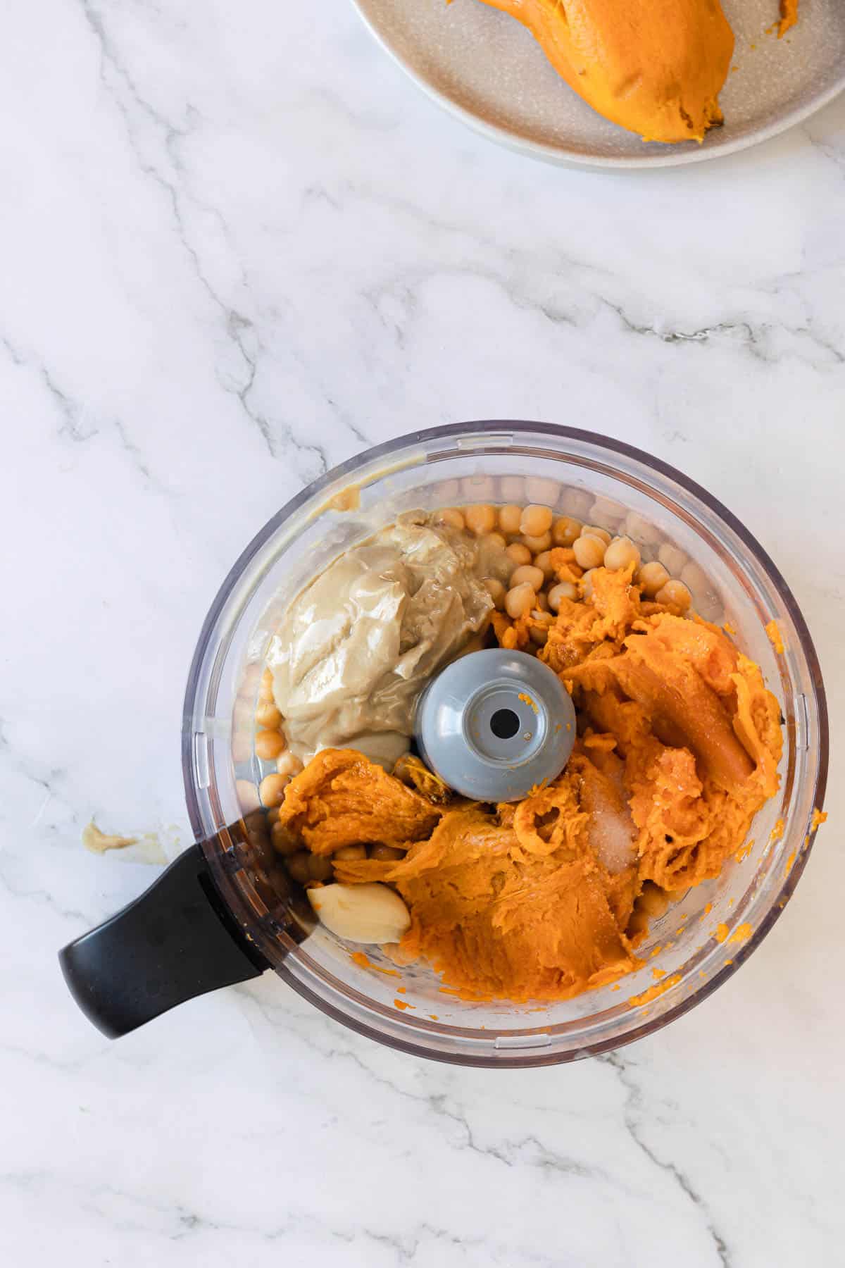 Ingredients placed into a food processor.