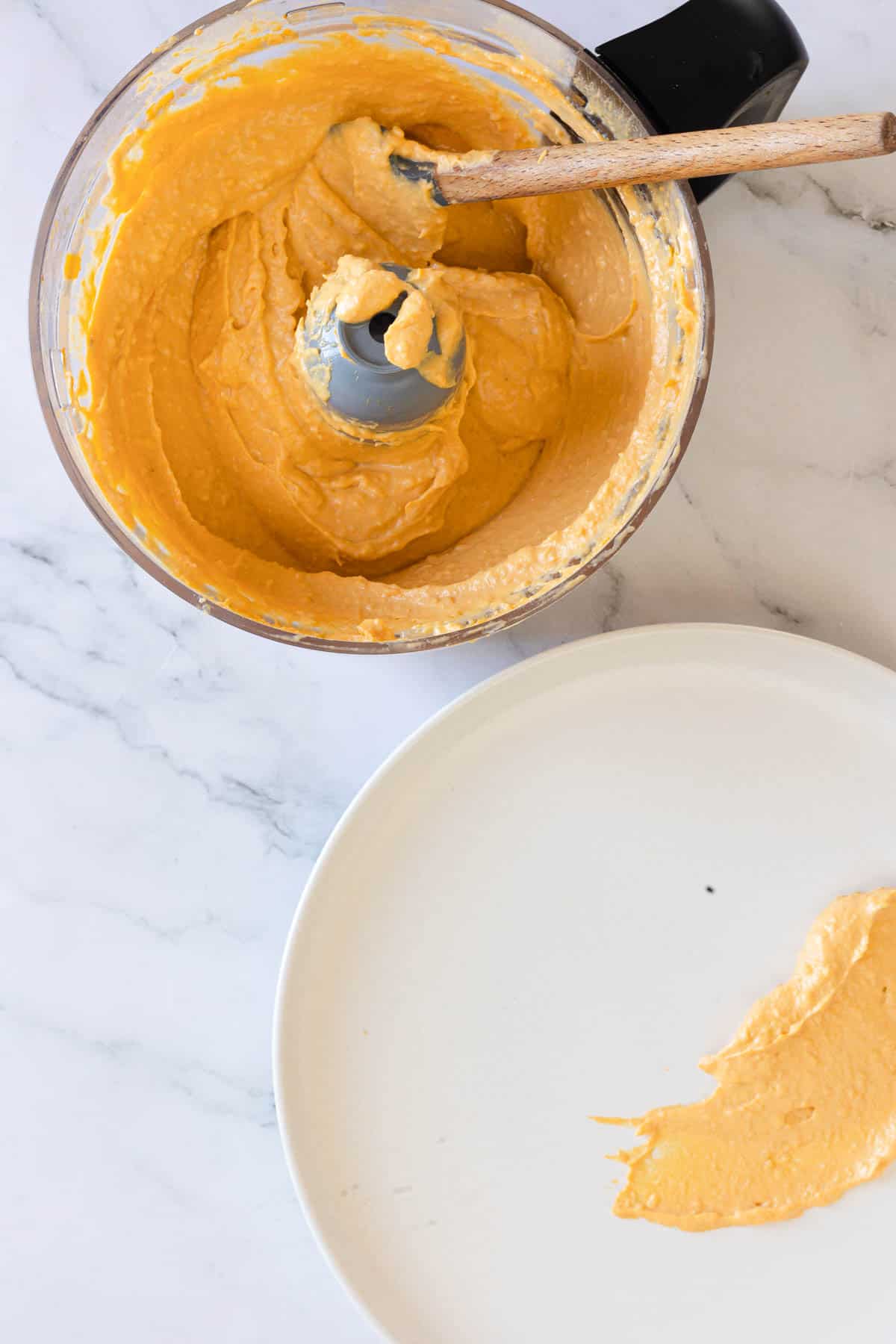 Blended sweet potato hummus ingredients still in the food processor.