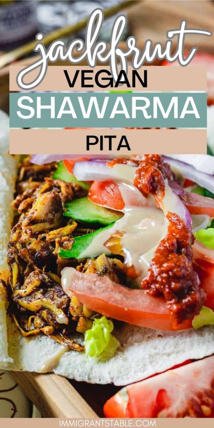 side view of vegan shawarma pita with shawarma sauces