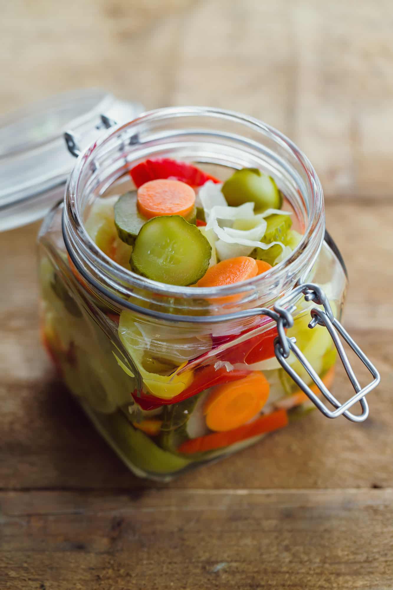 Pickled Middle Eastern vegetables  (torshi) in glass jar.