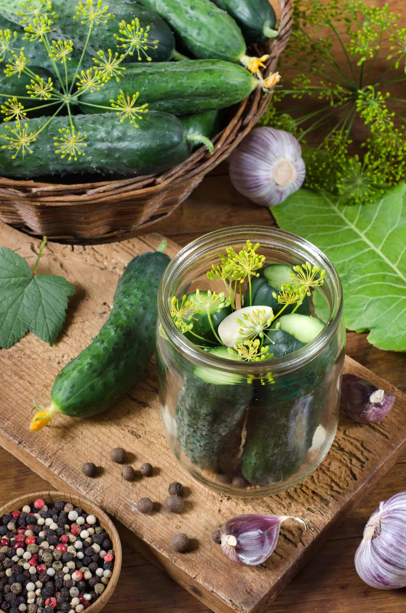 Preparation for pickling cucumbers with spices and herbs. Top view.  Сlose-up. Rustic style.