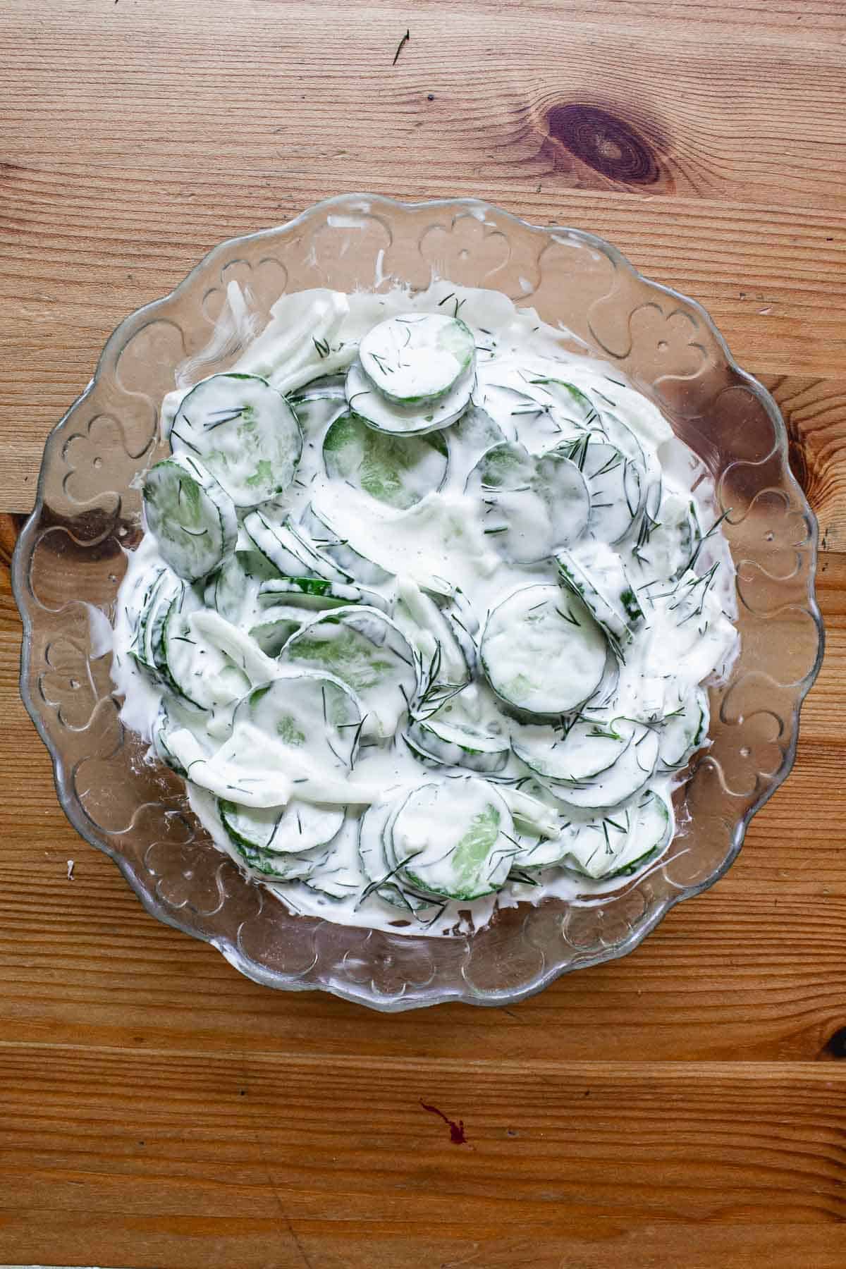 Close up on bowl of cucumber salad.