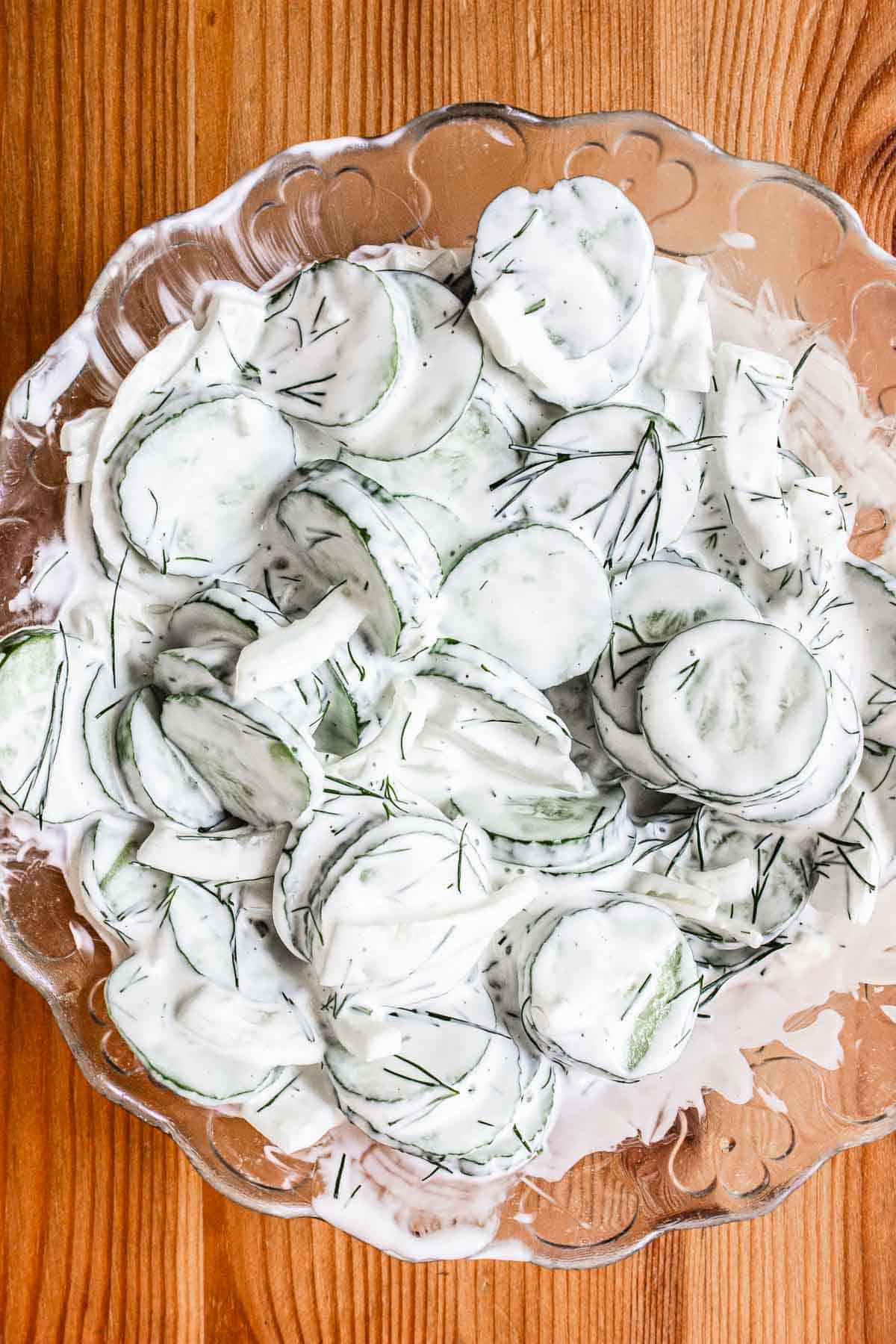 Close up on bowl of cucumber salad.