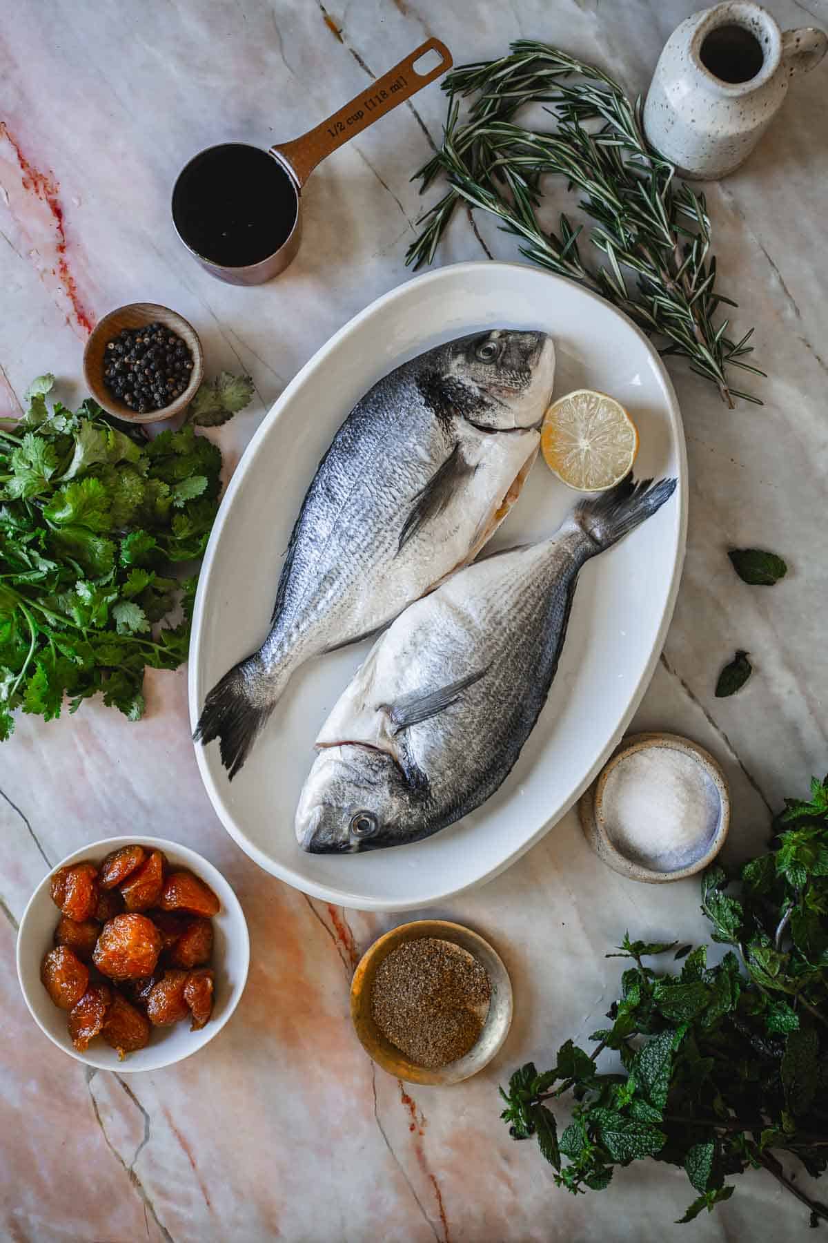 Whole fish with pomegranate sauce for rosh hashana ingredients.