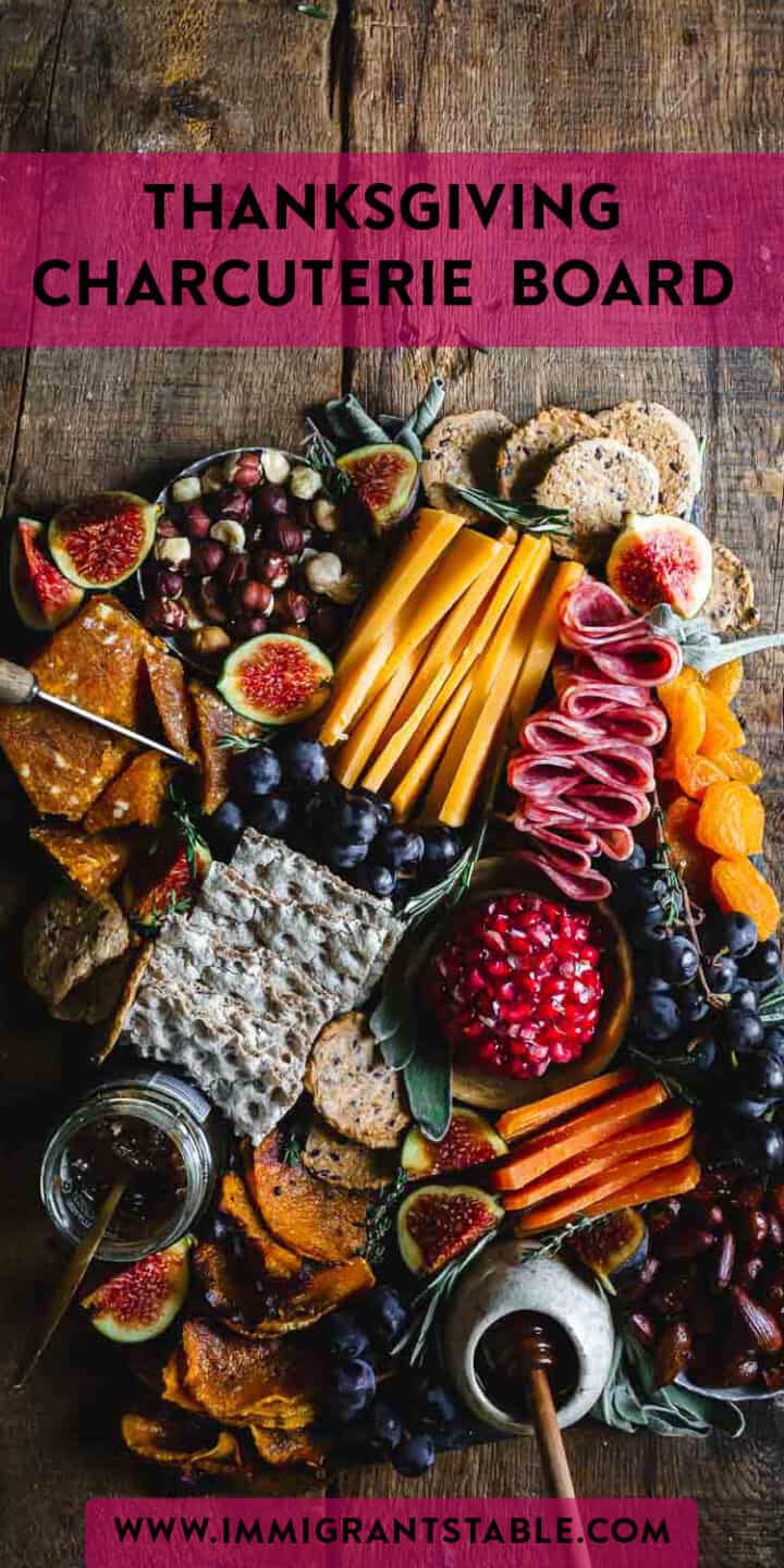 Thanksgiving charcuterie board featuring a delicious assortment of gourmet meats, cheeses, and other delectable bites.