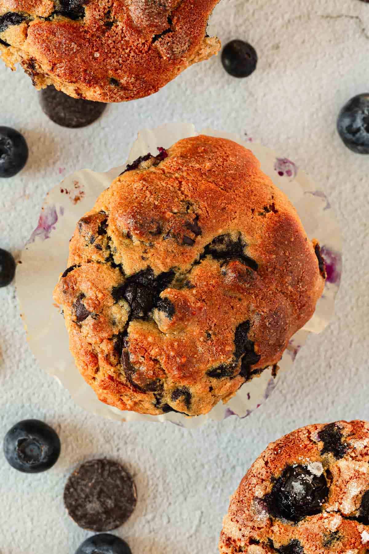 Gluten-free blueberry muffins on a white plate.