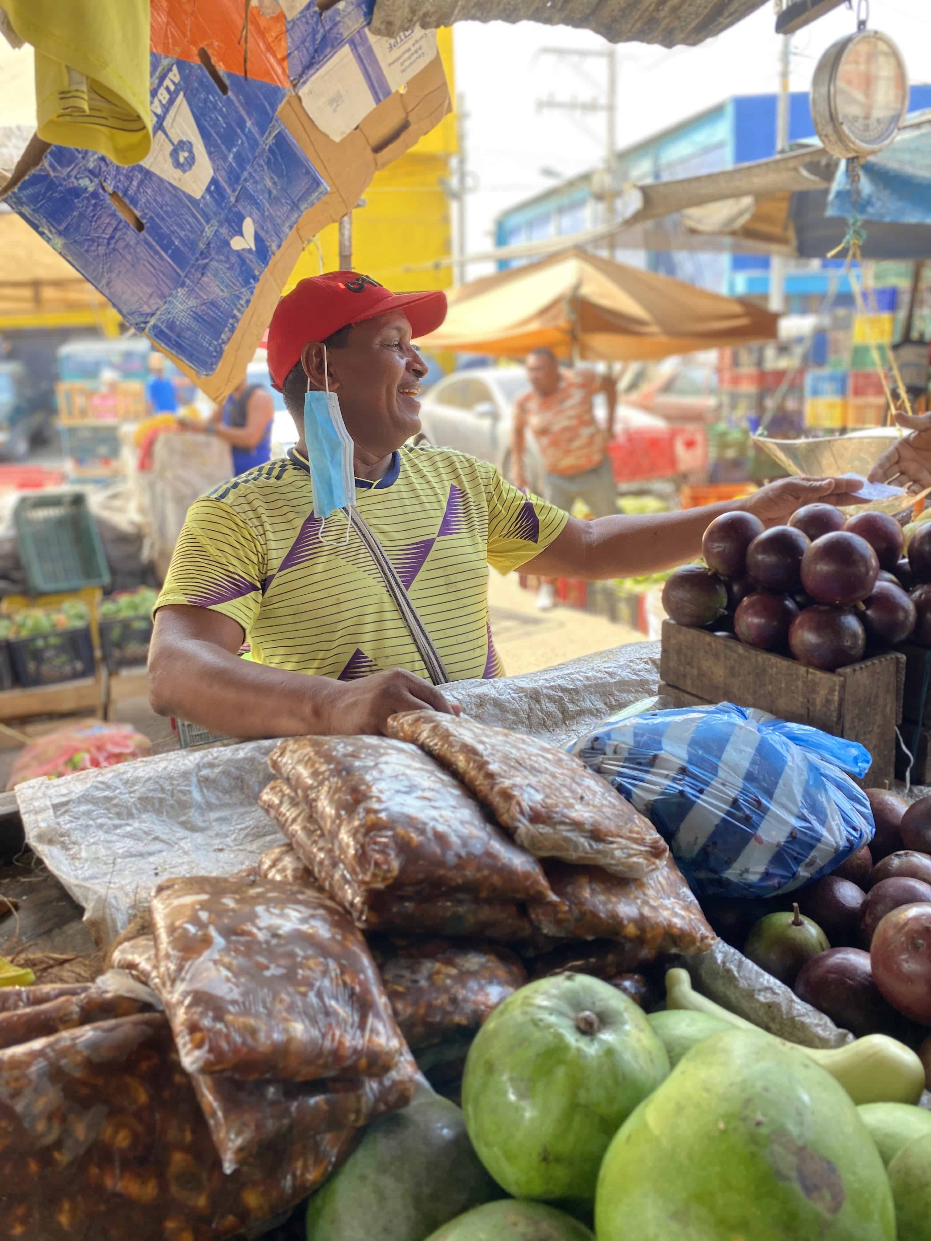 fruit seller with tamarind in bags