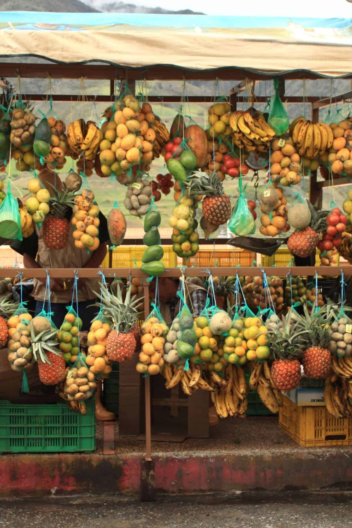 fruit hanging from stall in Cartagena, Colombia