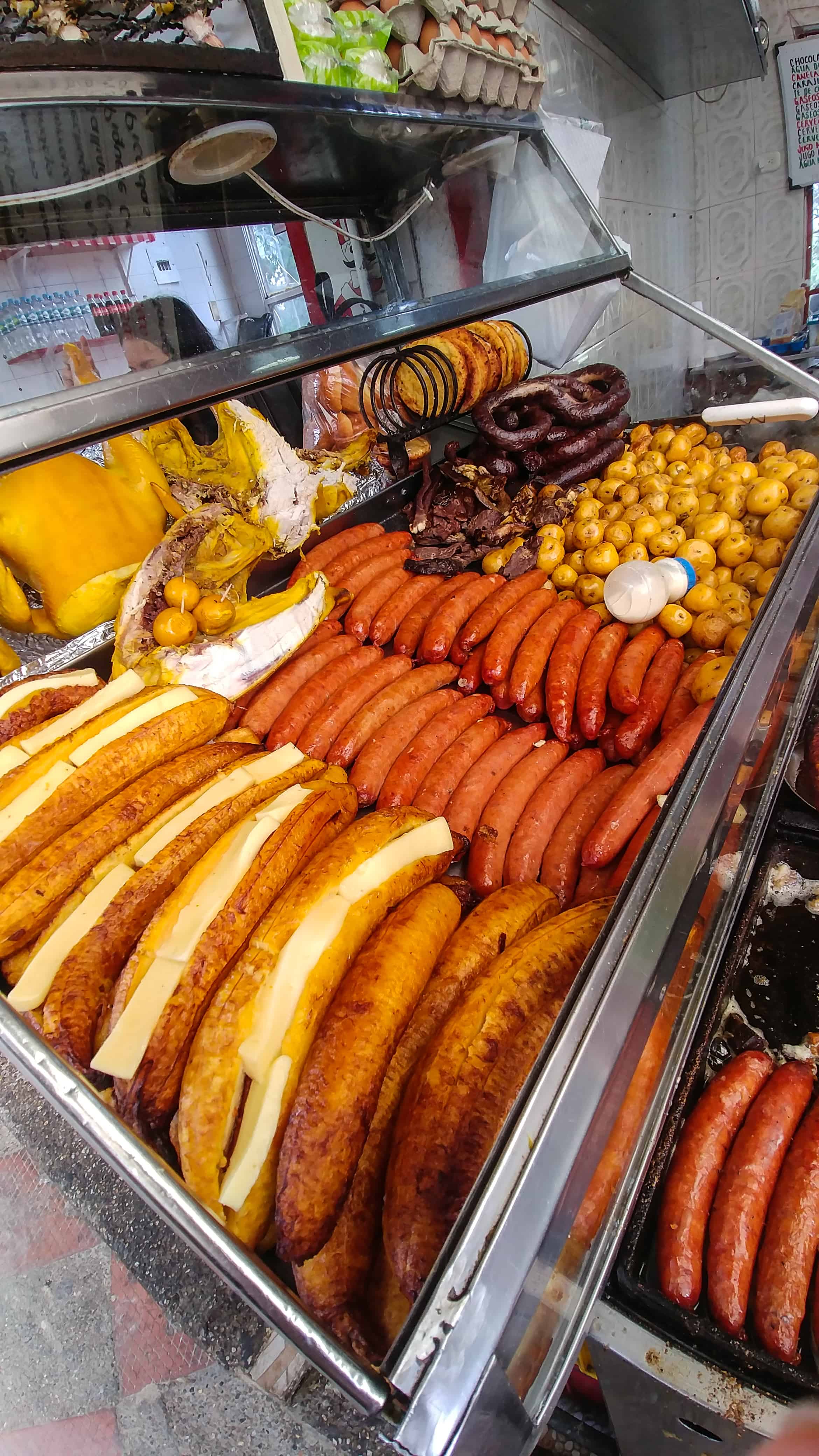 array of Colombian street food in a market