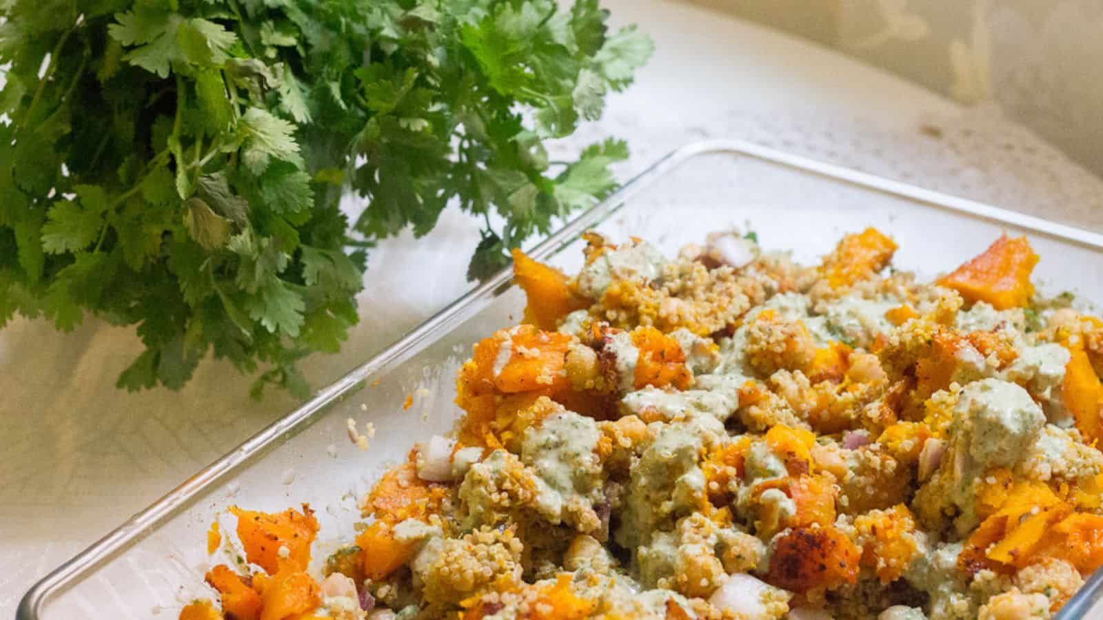 A dish of mashed kabocha squash with parsley.