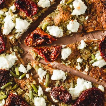 Overhead of garlic scape pesto pizza.