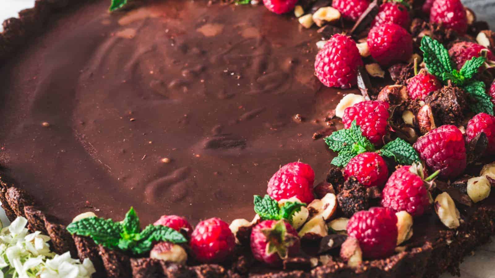 Overhead of raspberry chocolate tart.