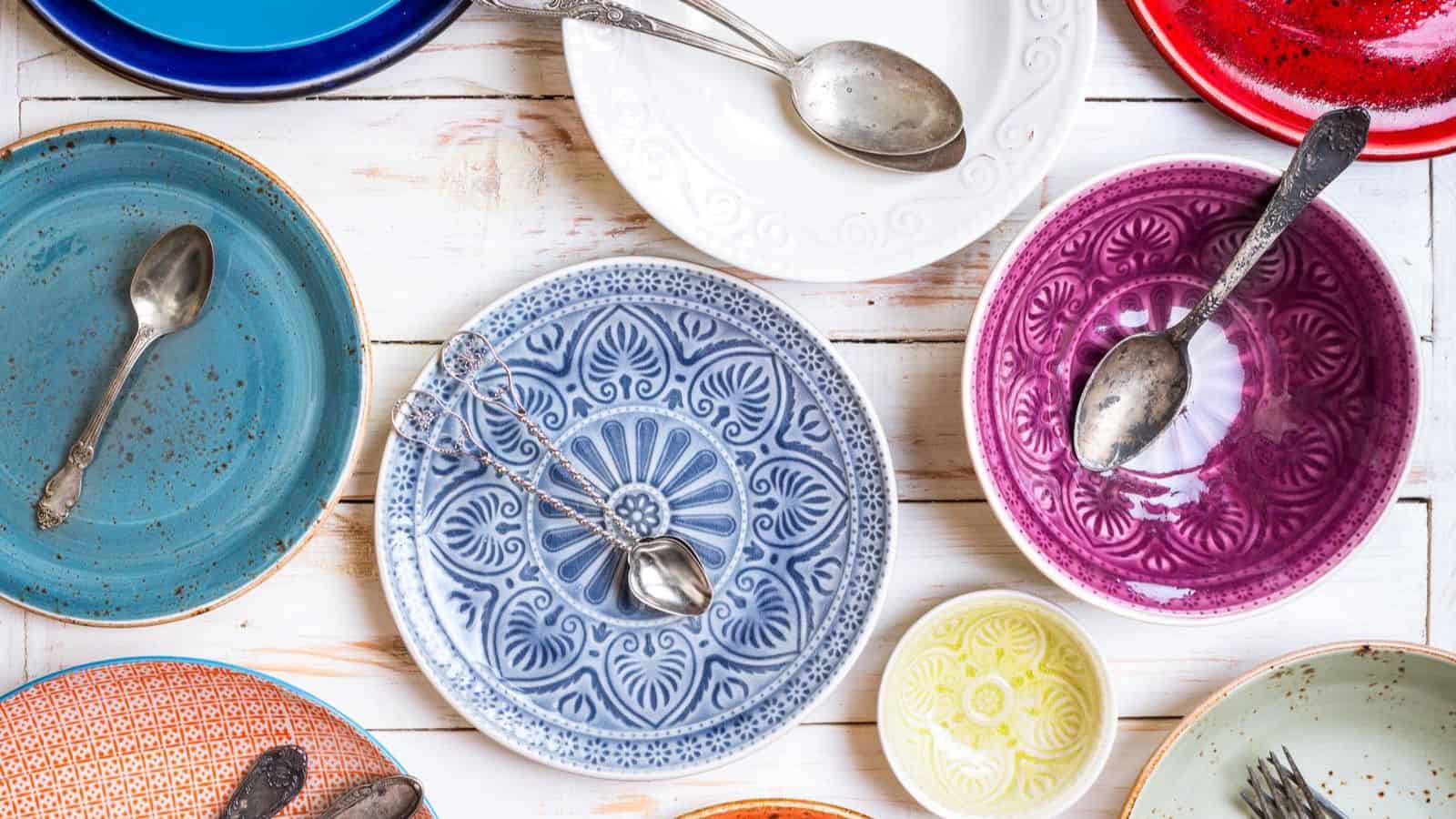 Vintage dishes with spoons on top placed on table