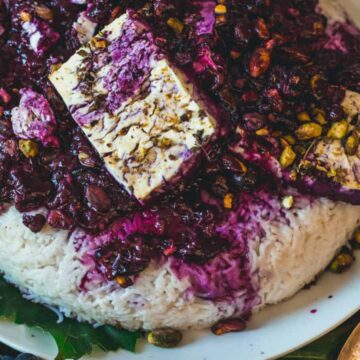Side view of rice with feta on top.