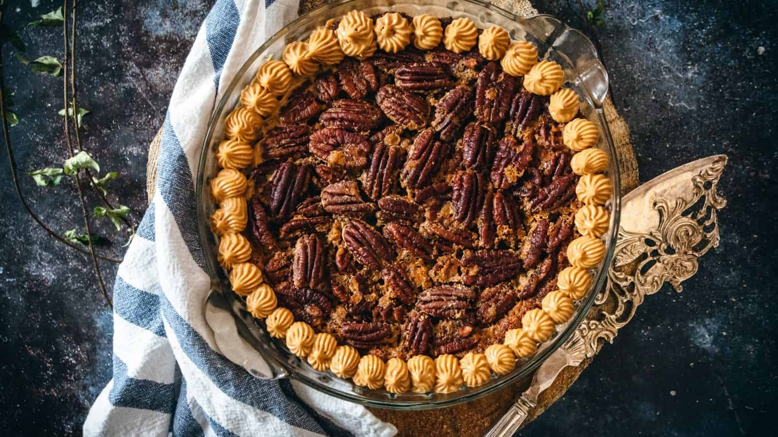 Close up of pecan pie with dulce de leche cream.