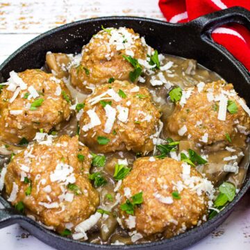 Marsala meatballs in a skillet.