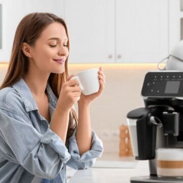 A woman enjoying her cup of coffee