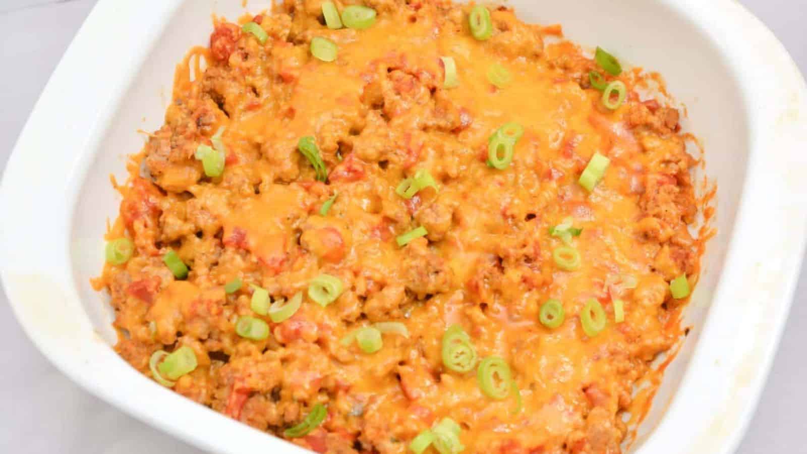 A casserole dish filled with meat and cheese.