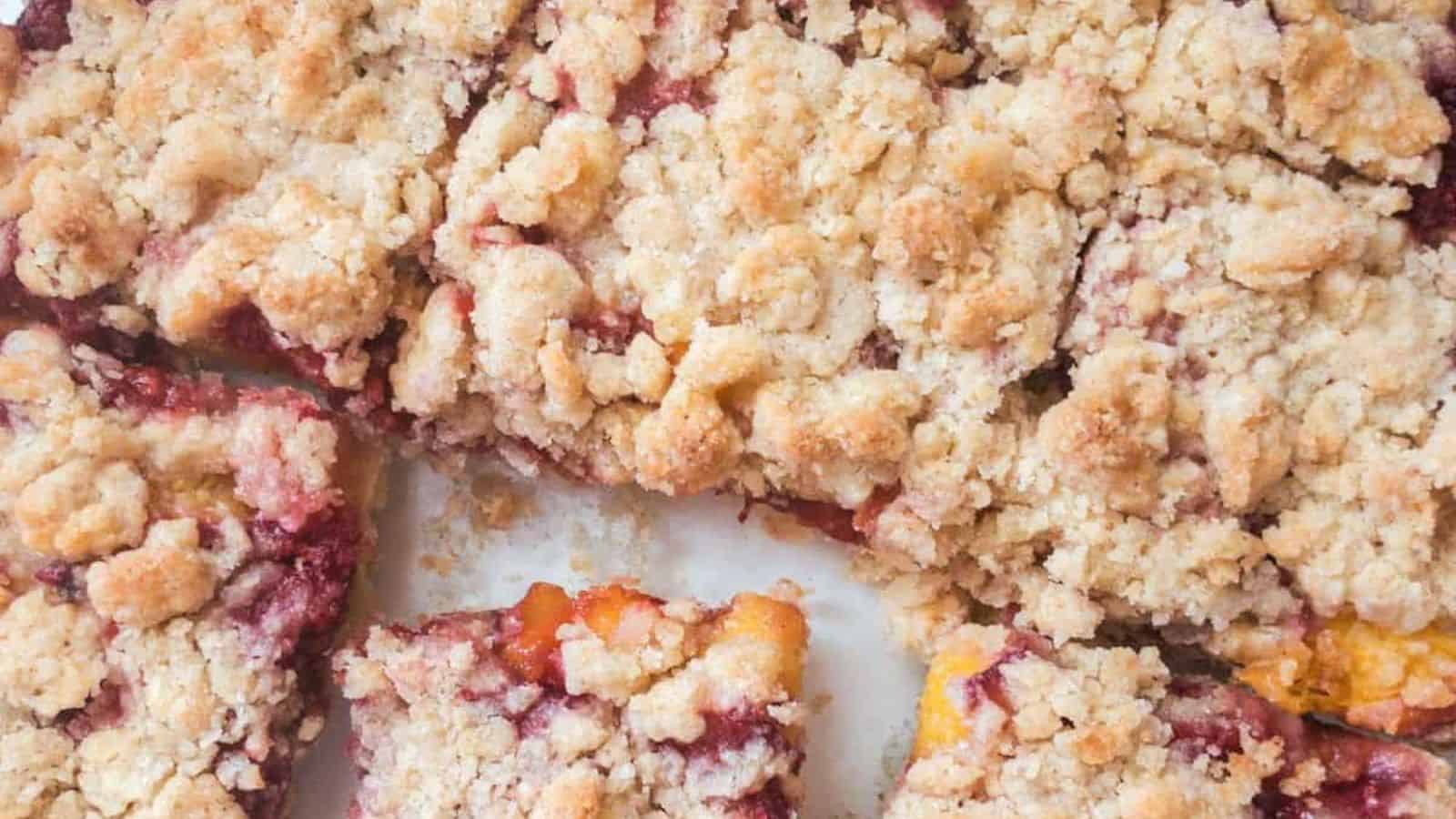 Peach raspberry bar cookies cut into squares.