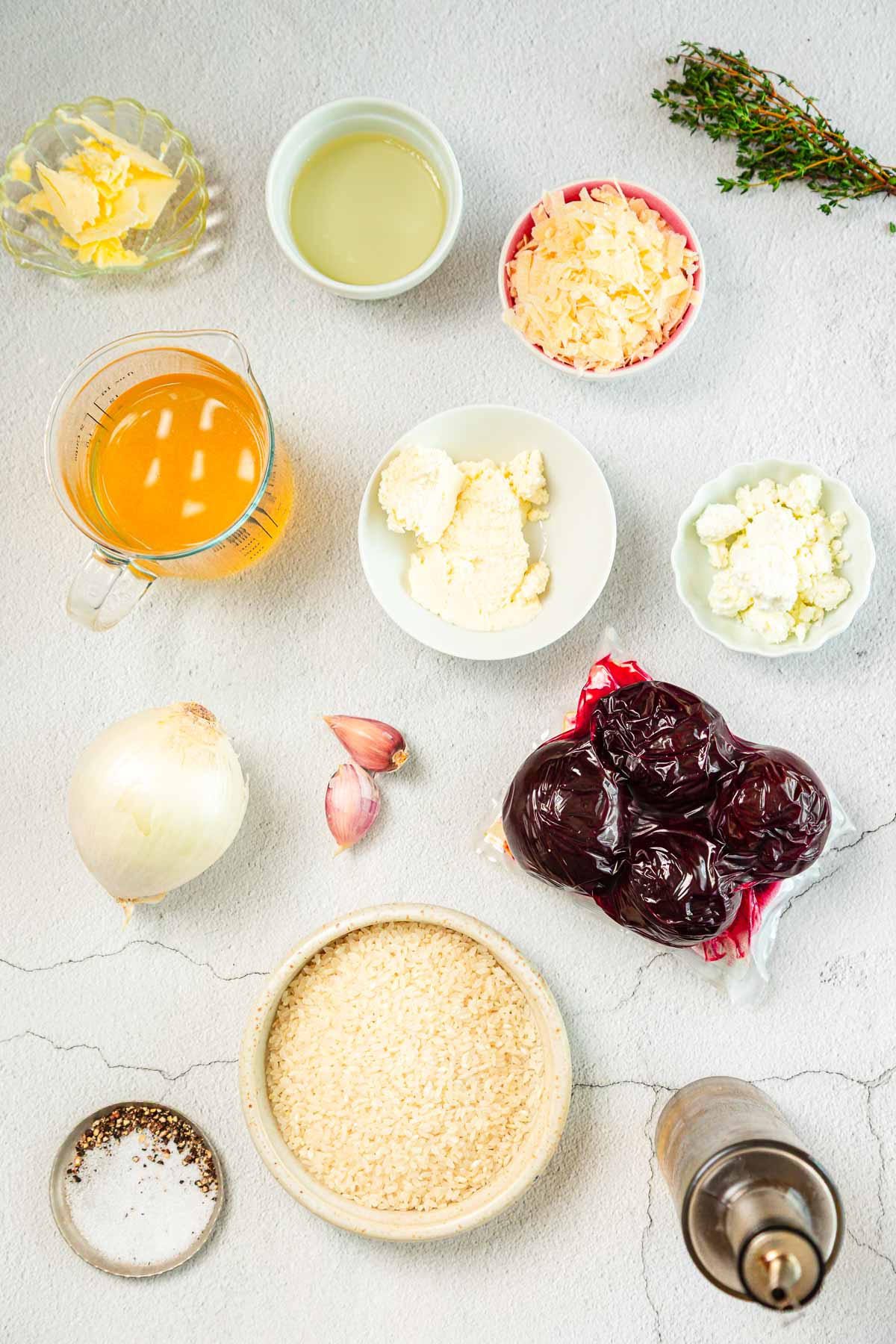 Ingredients for a dish on a white surface.