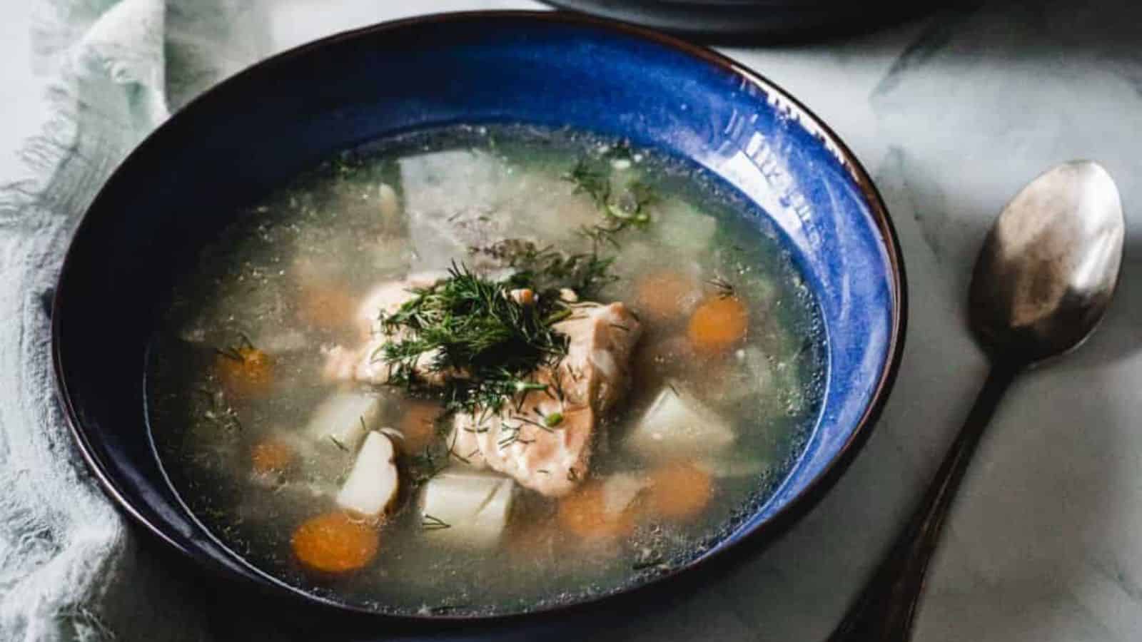 Overhead view of blue bowl of soup.