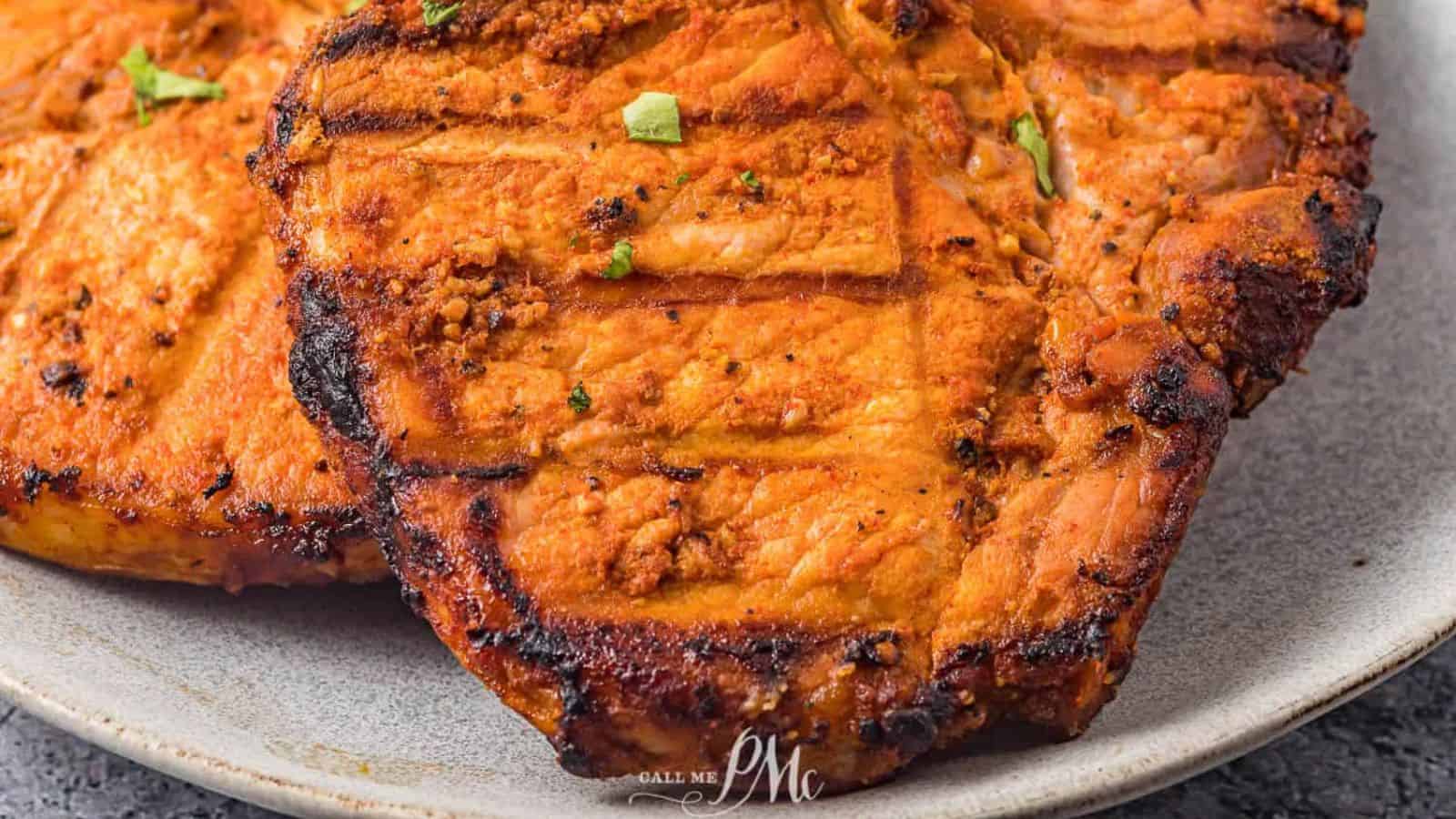 Close up photo of grilled boneless pork chops.