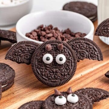 Decorated Oreo cookies with monster and bat faces for Halloween, creativity in baked treats.