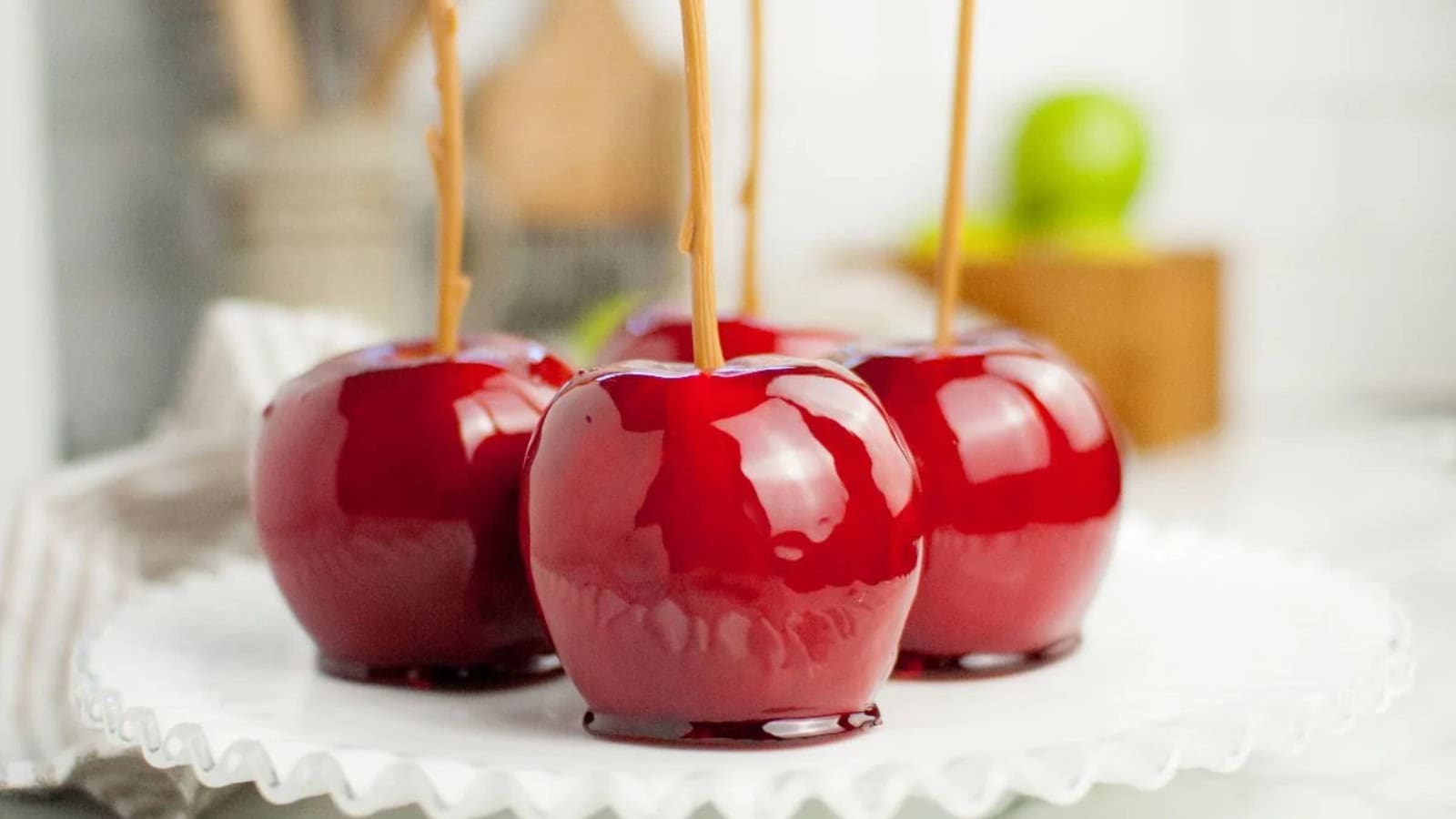 Sweet candied apples with caramel coating, ideal for cultural celebrations and immigrant community gatherings.