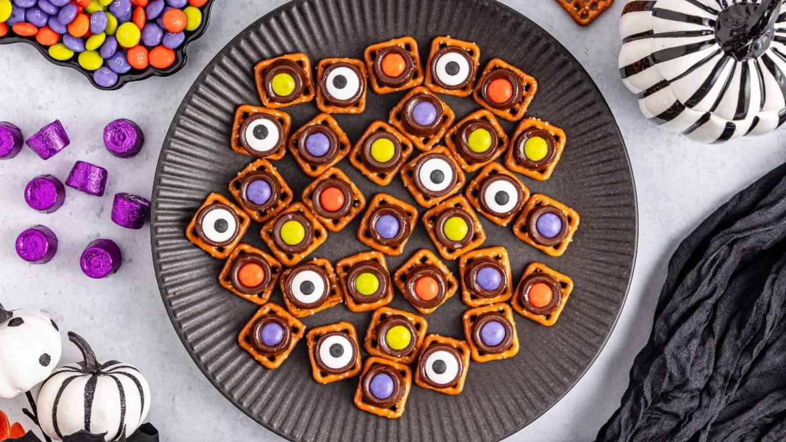 A plate of Halloween-themed pretzels.