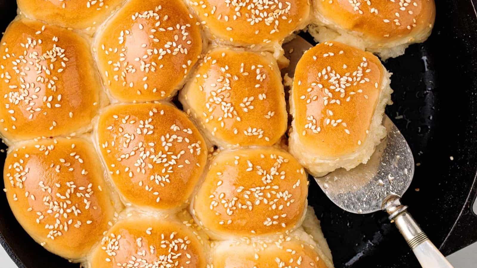 Honeycomb bread being scooped out of the pan.