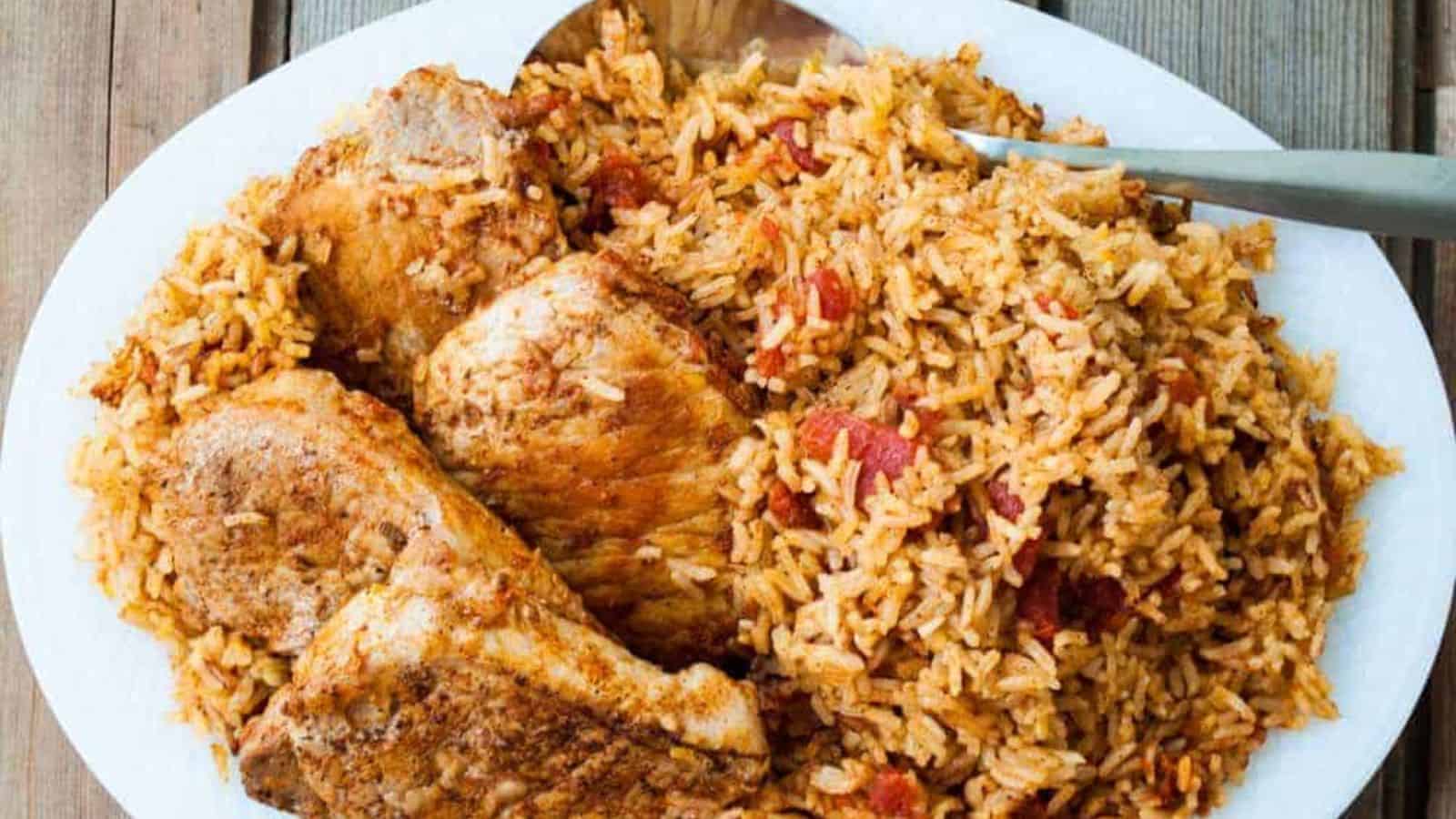 Spanish Rice and pork chops on a platter.