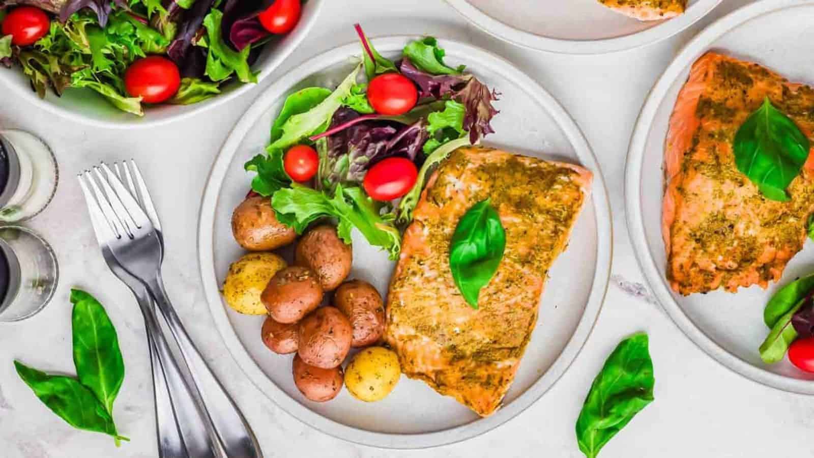 A plate of pesto salmon.
