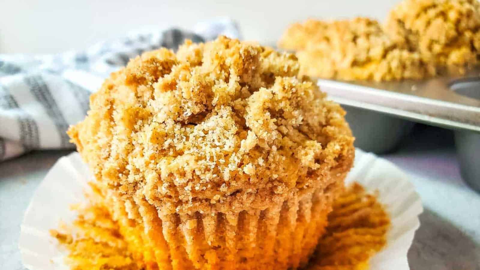 Pumpkin muffin topped with streusel.