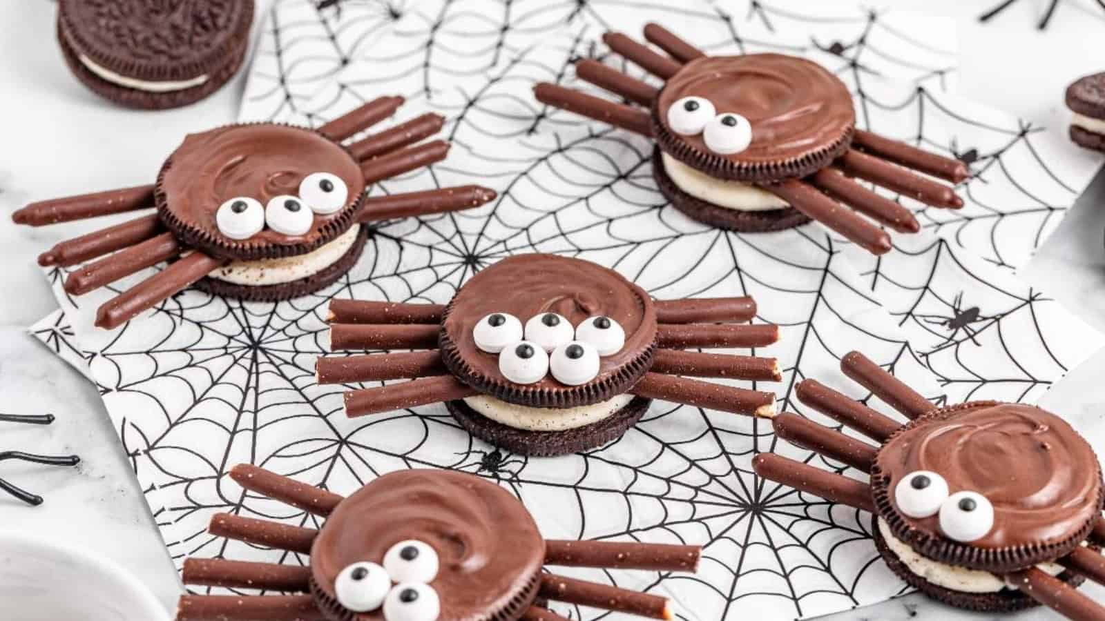 Charming and creepy Halloween spider cookies with Oreo, pretzel, and candy eyes, perfect for themed celebrations.