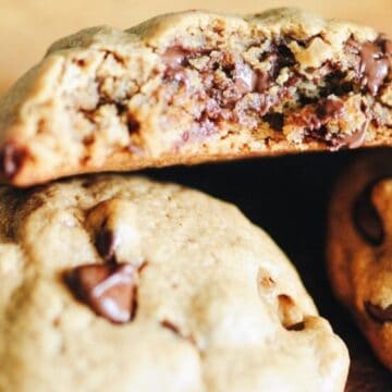 Sweet chocolate chip cookies, fresh baked at the immigrant’s table, showcasing diverse culinary traditions.