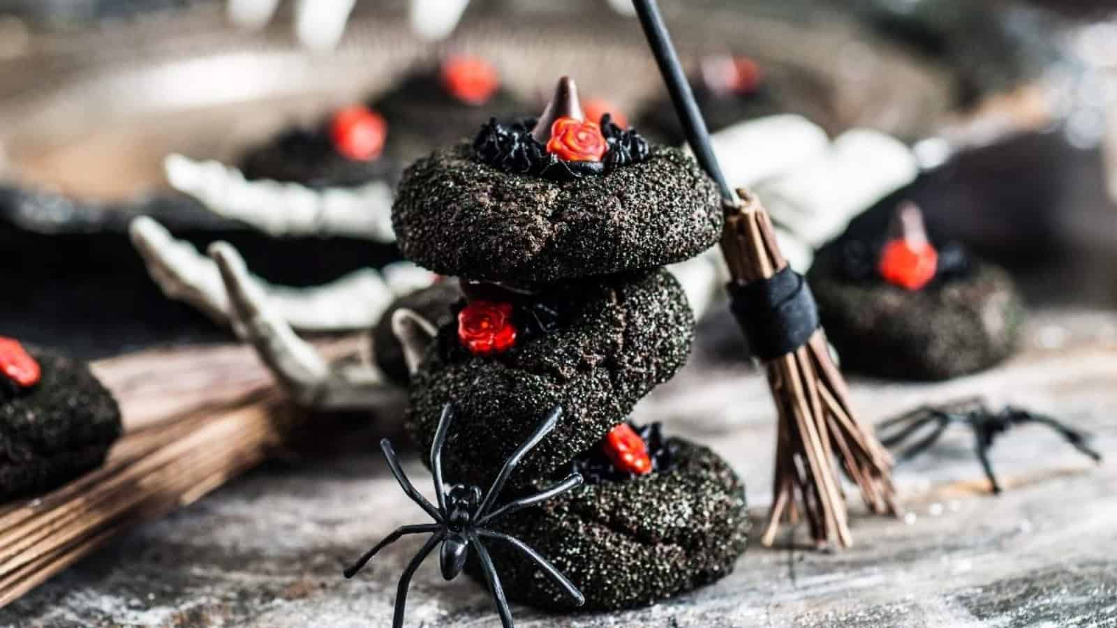 A stack of three witch hat cookies.