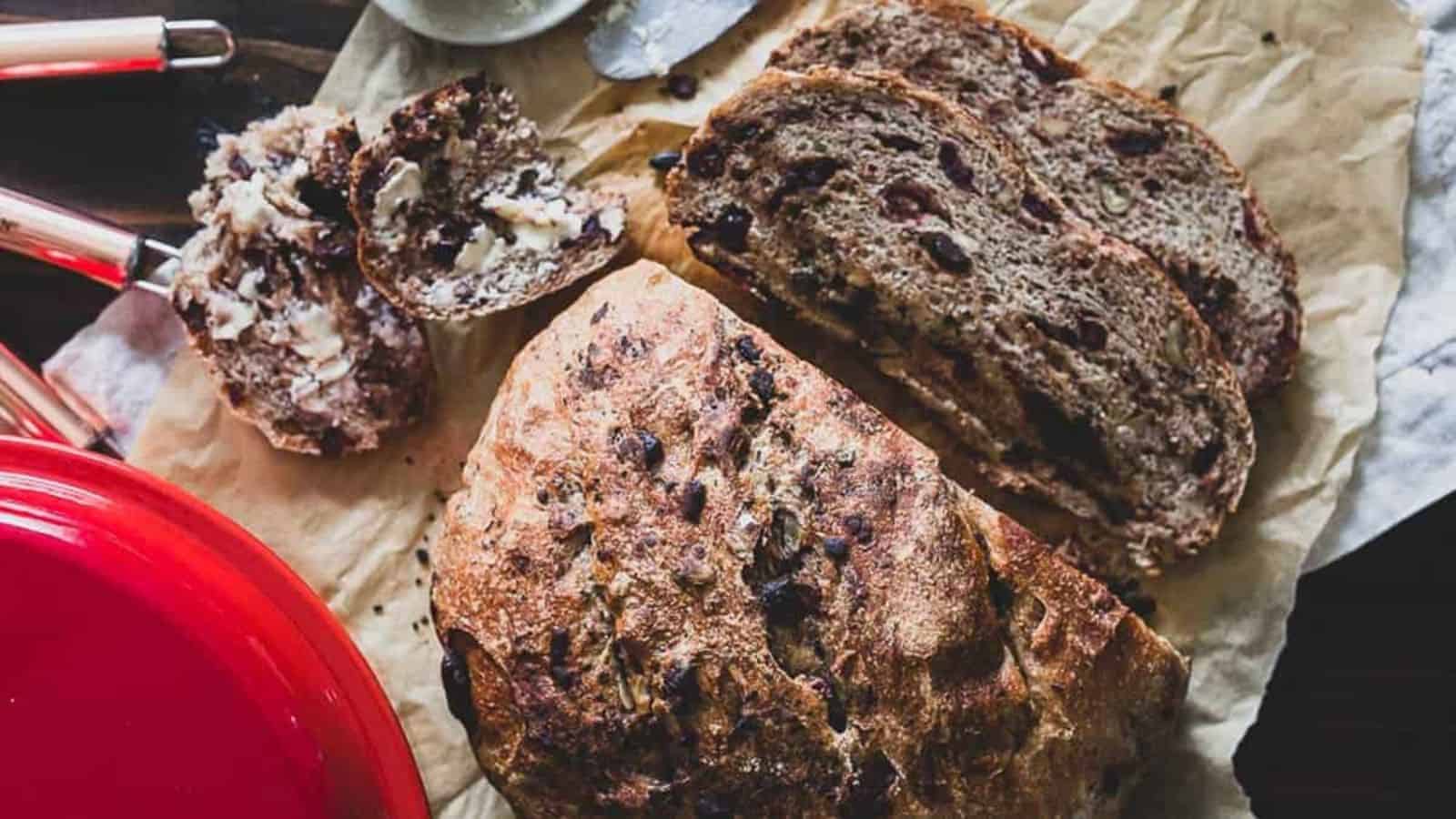 A loaf of bread is sitting on a piece of paper.