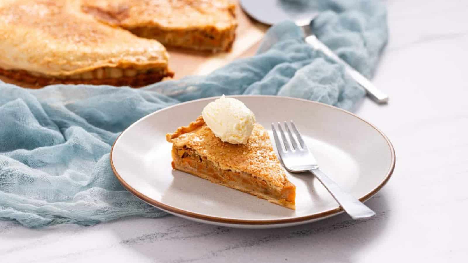 An image of a slice of pie on a plate.